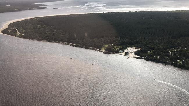 Whale rescue operations at Macquarie Heads in Strahan on the right. Picture: PATRICK GEE