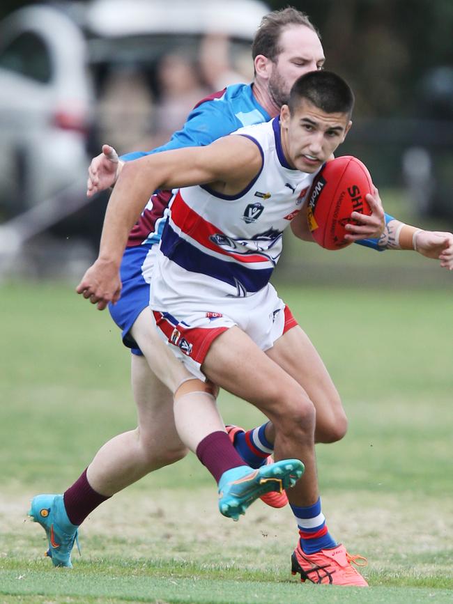 Football BFL: Modewarre v Queenscliff. Modewarre 16 Jackson OÃ•Hanlon chases Queenscliff 57 Sol Bowtell Picture: Mark Wilson