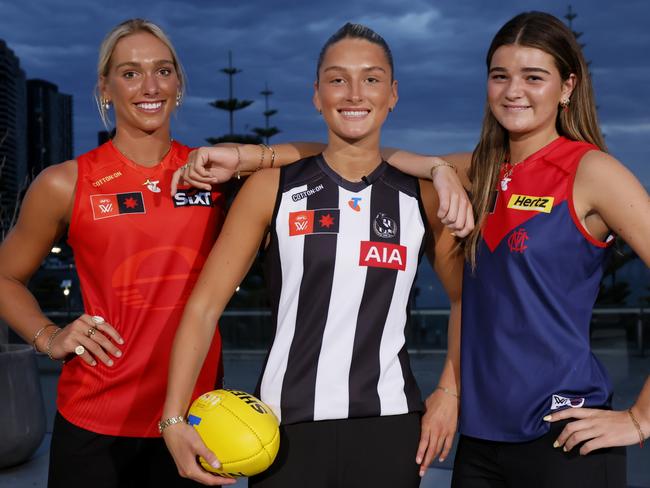 MELBOURNE, AUSTRALIA - DECEMBER 16: Top 3 draft picks Ash Centra of the Magpies (C), Havana Harris of the Suns (L) and Molly O'Hehir of the Demons pose during the 2024 Telstra AFLW Draft at Marvel Stadium on December 16, 2024 in Melbourne, Australia. (Photo by Dylan Burns/AFL Photos via Getty Images)