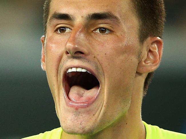 MELBOURNE, AUSTRALIA - JANUARY 21: Bernard Tomic of Australia shows his emotion in his second round match against Philipp Kohlschreiber of Germany during day three of the 2015 Australian Open at Melbourne Park on January 21, 2015 in Melbourne, Australia. (Photo by Cameron Spencer/Getty Images)