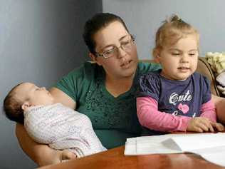 BALANCING THE BUDGET: Bernadette Dennis with her two daughters, Rachael, 4 months and Caitlyn, 2. Picture: Brenda Strong GLABUDG