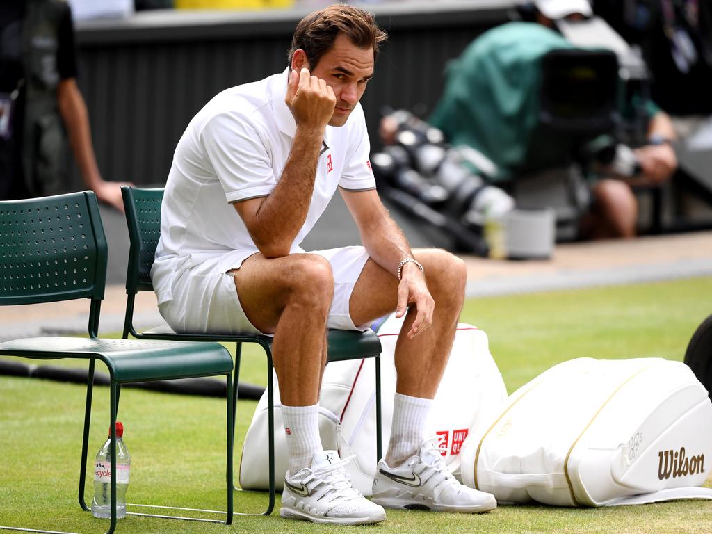 Roger Federer reacts following his defeat. (Photo by Matthias Hangst/Getty Images)