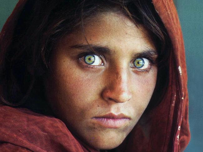 Afghan refugee Sharbat Gula who appeared on the cover of National Geographic magazine in 1985 in her village in Afghanistan . (Pic: Steve McCurry)