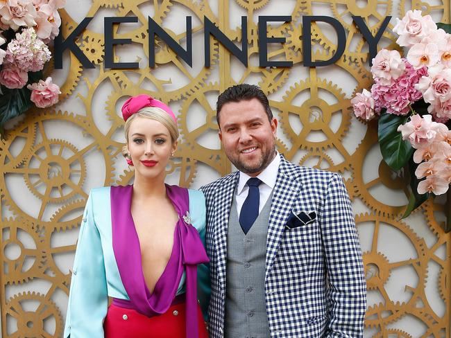 MELBOURNE, AUSTRALIA - NOVEMBER 08: Jaimee Belle Kennedy poses with husband James Kennedy at the Kennedy Marquee on Oaks Day at Flemington Racecourse on November 08, 2018 in Melbourne, Australia. (Photo by Sam Tabone/Getty Images)