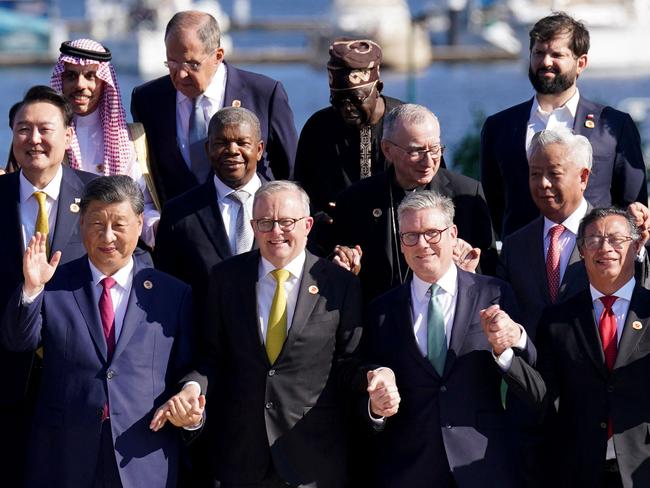 Australia’s Prime Minister Anthony Albanese stands next to G20 world leaders including China's President Xi Jinping, UK's Prime Minister Keir Starmer and Colombia's President Gustavo Petro. Picture: AFP