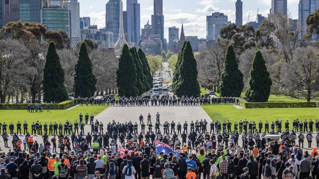 Protesters face off against police on the steps of the Shrine. Picture: Jason Edwards