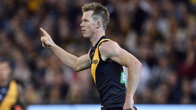 Richmond Tigers player Jack Riewoldt reacts after kicking against the Carlton Blues during round one of the AFL at the MCG in Melbourne, Thursday, March 24, 2016. (AAP Image/Julian Smith) NO ARCHIVING, EDITORIAL USE ONLY