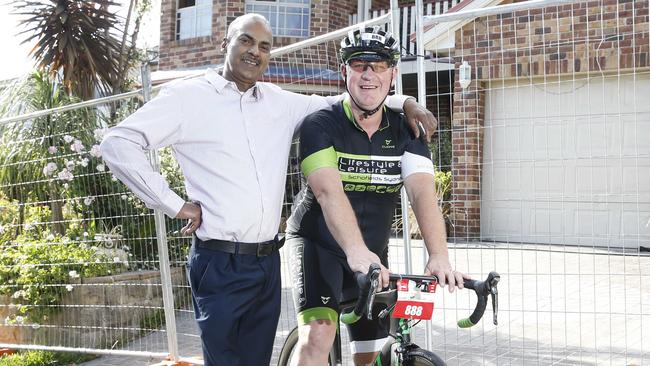 Picture on his bike, Glen Coker helped save Keshwa Singh and his family from a house fire. Pictures: David Swift