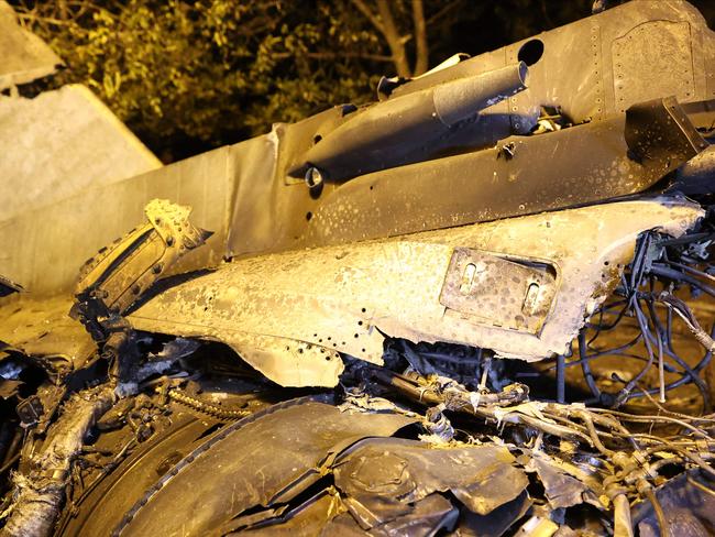 The wreckage of a Sukhoi Su-34 military jet lie at the crash site in the courtyard of a residential area in the town of Yeysk in southwestern Russia. Picture: AFP