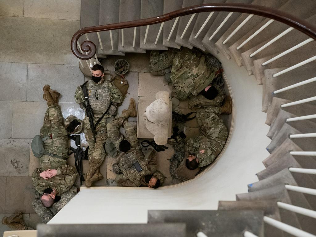 The guards were seen sleeping under a bust of President George Washington inside the U.S. Capitol. Picture: Kevin Dietsch/UPI/Shutterstock