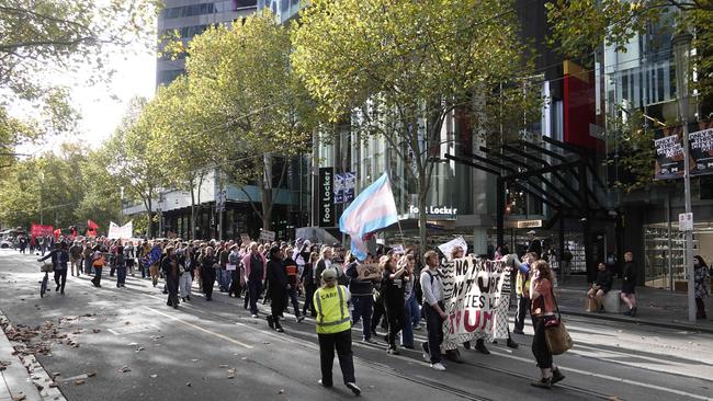 The group march toward Melbourne Central. Picture: Valeriu Campan