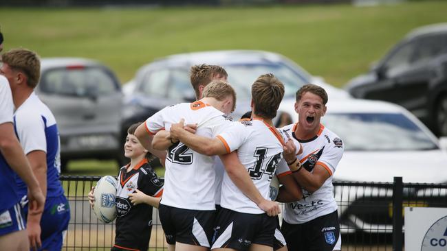 The Macarthur Wests Tigers celebrate a try against the North Coast Bulldogs during round two of the Laurie Daley Cup at Kirkham Oval, Camden, 10 February 2024. Picture: Warren Gannon Photography