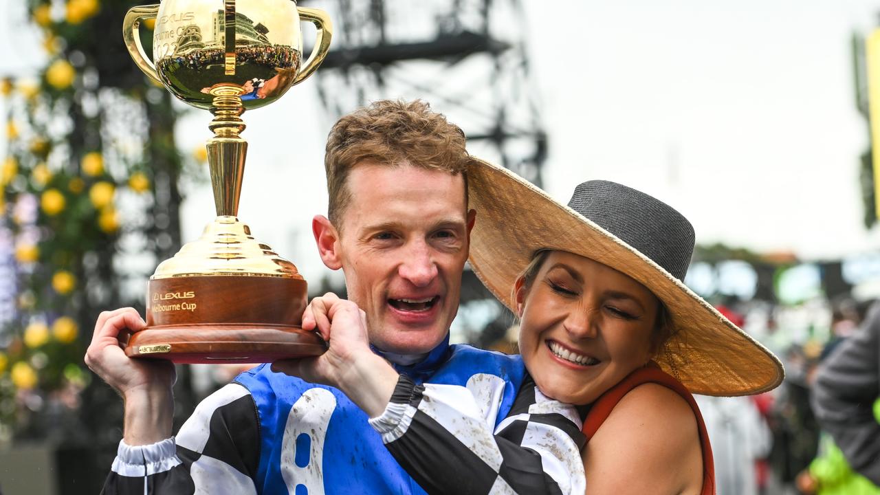 Mark Zahra is kissed by wife Elyse Zahra after riding Gold Trip to victory. Photo by Vince Caligiuri/Getty Images