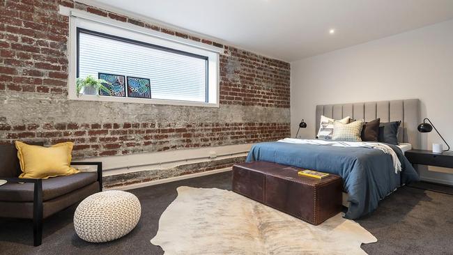 Even the bedrooms have industrial appeal.