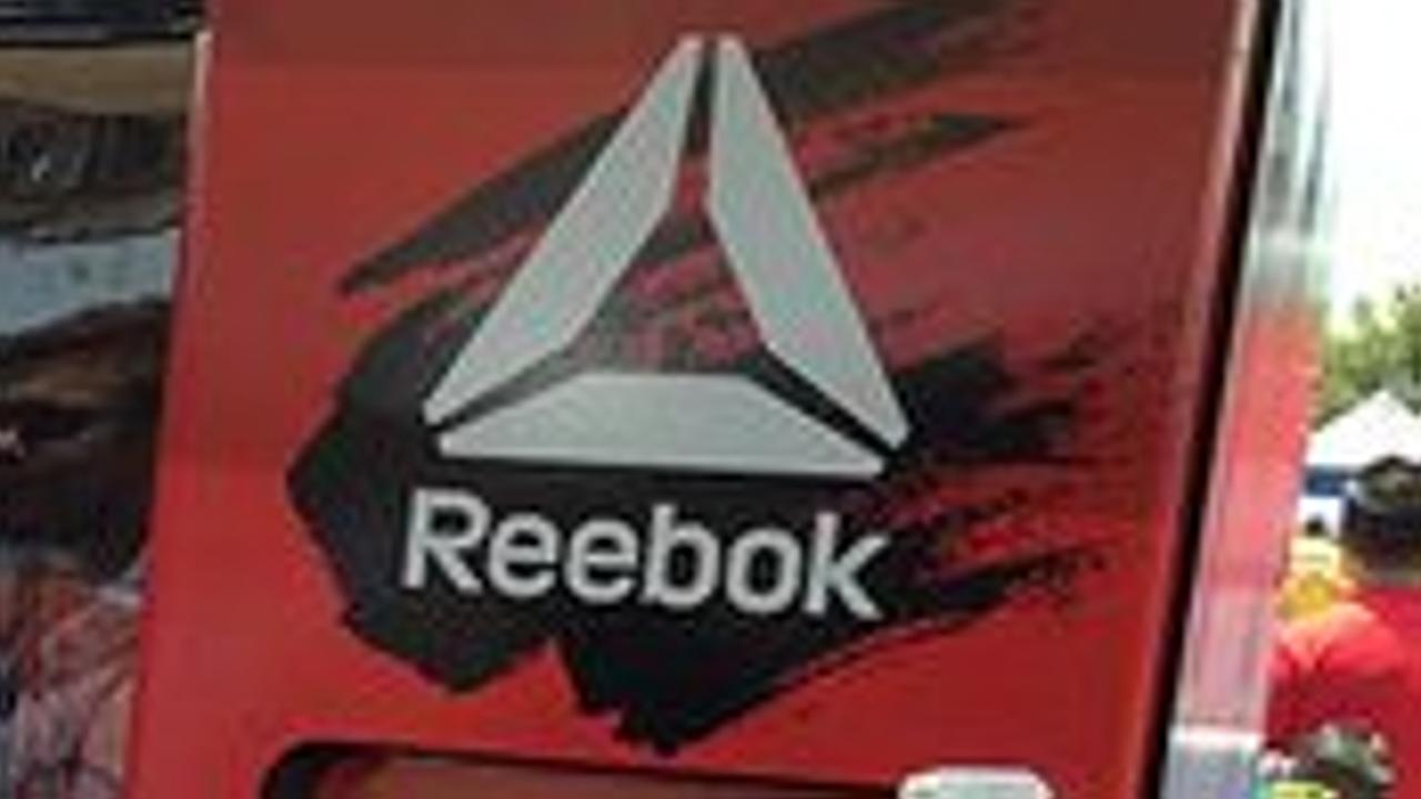 UFC fighter Conor McGregor shows the new Reebok clothing line