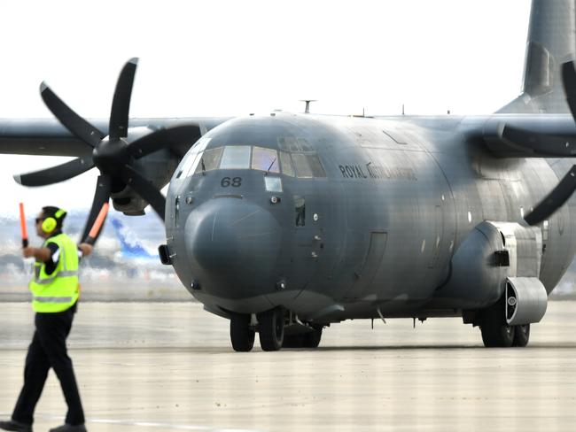 A C-130 Hercules arrives with survivors at Sydney Airport. Picture: AAP