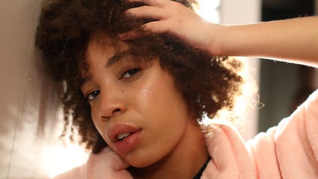 A model poses backstage