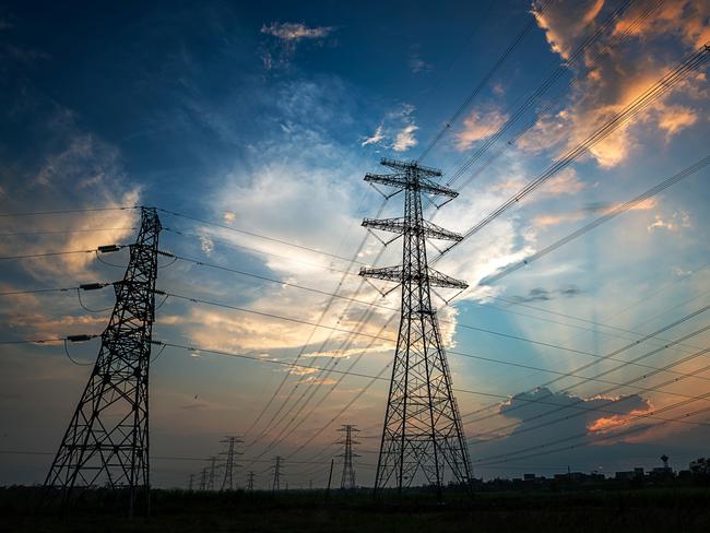 Electricity Pylon power line transmission tower at sunset.Generic photo of powerlinesPicture: iStock