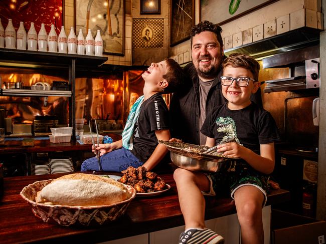 Welgemoed with sons Max, 9, and Alex, 6, at Africola. Picture: Matt Turner