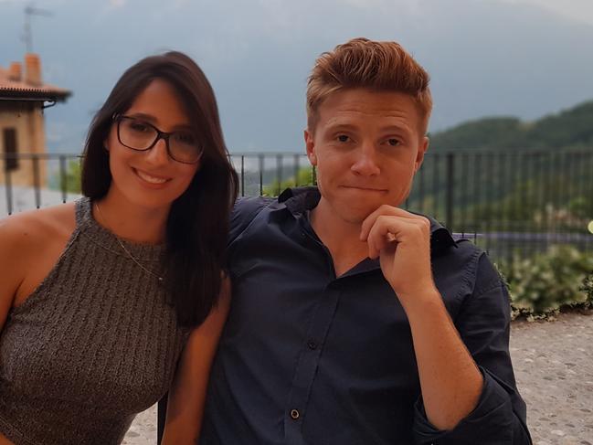 Since coronavirus hit Italy, David Wooley, right, and his Italian girlfriend Veronica Berasi, pictured here on the balcony of Veronica's family business the Hotel Stella D'Oro in Tremosine,  have a lot of spare time on their hands.