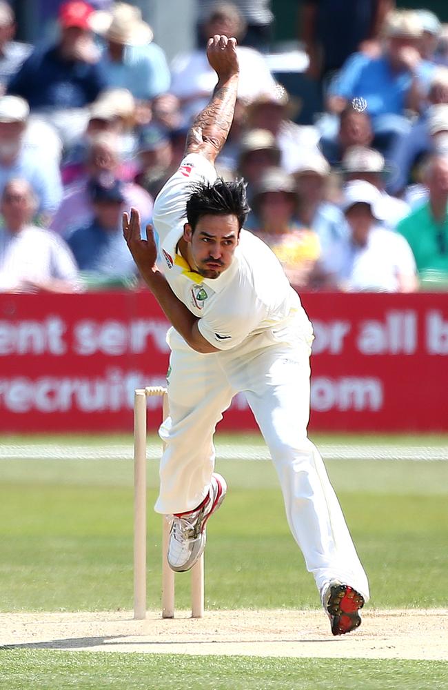 Mitchell Johnson of Australia bowls in the tour match against Kent.