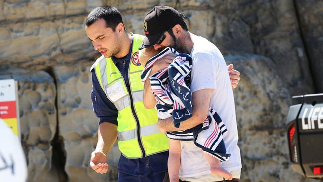 The scene at Bar Beach, Newcastle, where a car plunged of a car park lookout into the sea. Picture by Peter Lorimer.