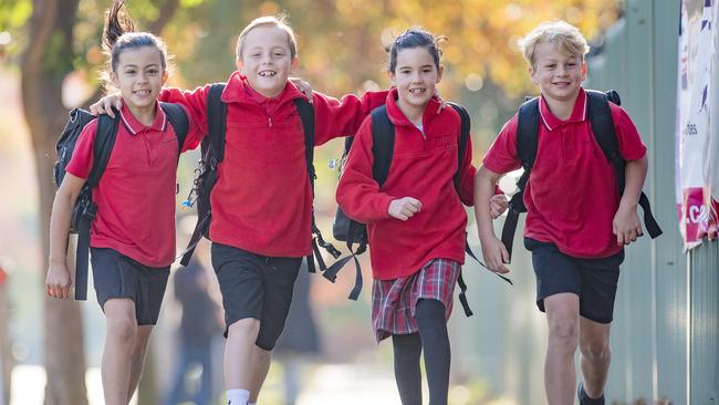 Solway Primary School promotes National Walk Safely to School Day to students, including Rebecca, 9, Sam, 10, Lucy, 9 and Remy, 10. Picture: Jason Edwards