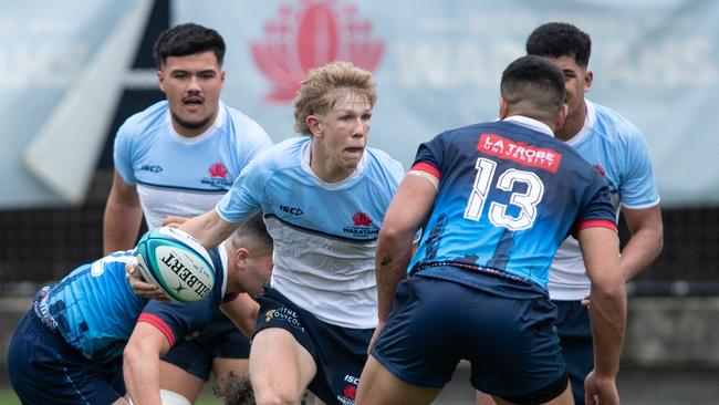 Tom Morrison on the burst in the U19 round three match. Pics: Julian Andrews