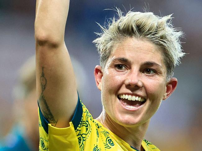 Australia's forward #02 Michelle Heyman celebrates her team's victory after the women's group B football match between Australia and Zambia during the Paris 2024 Olympic Games at the Nice Stadium in Nice on July 28, 2024. (Photo by Valery HACHE / AFP)