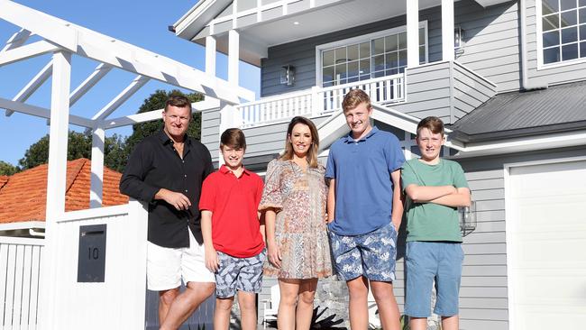 Jason and Kerry Fenton with Harvey, 11, William, 14, and Jackson, 12, at the home they are selling in Wavell Heights. Pics Tara Croser.