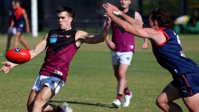 Joshua Gasparini of Old Haileybury (L) in action against Old Brighton in Round 2. Picture: Hamish Blair