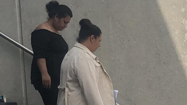 Julie Mitai Moala (pictured in cream cardigan) leaves Mt Druitt Local Court on January 29 after being sentenced on an animal cruelty charge. Picture: Kate Lockley