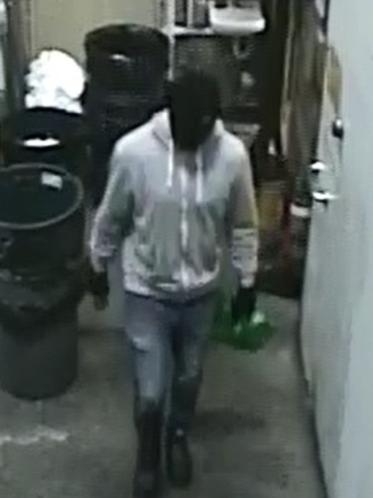 Police have released CCTV images of the masked man