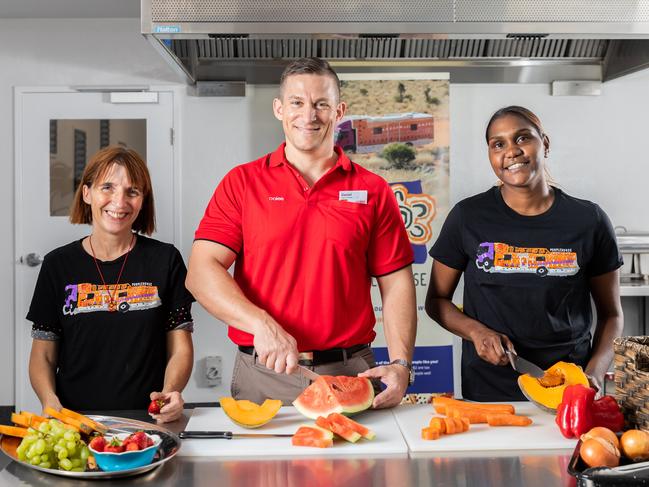 Purple House CEO Sarah Brown, Coles Regional Manager Daniel Clegg and Purple House team member Chloe Dodd