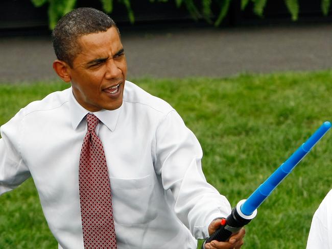 President Barack Obama jokingly attacks Olympic fencer Tim Morehouse during a fencing demonstration on the South Lawn of the White House promoting the city of Chicago’s bid for the 2016 Summer Olympics September 16, 2009 in Washington, DC. Picture: Win McNamee/Getty Images