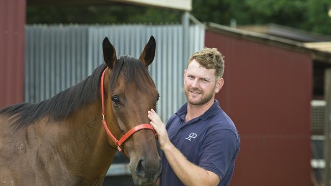 Trainer Shaun Dwyer Jnr with his winning horse La Jument. Picture: Kevin Farmer