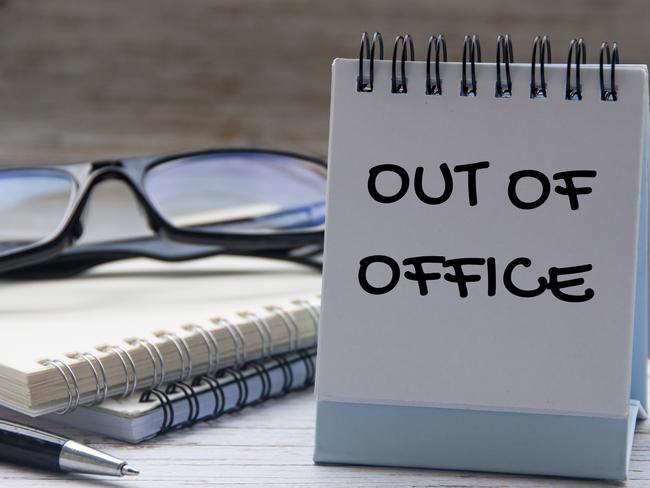 Out of office text on calendar desk with notebook and glasses background. Out of office concept. Picture: iStock