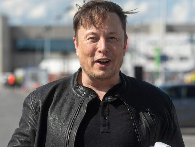 Tesla CEO Elon Musk is seen at the construction site for the new plant, the so-called 