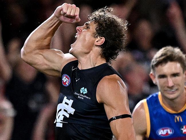 BRISBANE, AUSTRALIA - MARCH 08: Charlie Curnow of the Blues celebrates kicking a goal during AFL Opening Round match between Brisbane Lions and Carlton Blues at The Gabba, on March 08, 2024, in Brisbane, Australia. (Photo by Bradley Kanaris/Getty Images)