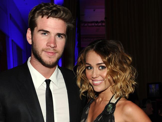 Cyrus and Hemsworth backstage during Muhammad Ali's Celebrity Fight Night XVIII in Phoenix Arizona in March 2012. Picture: Getty