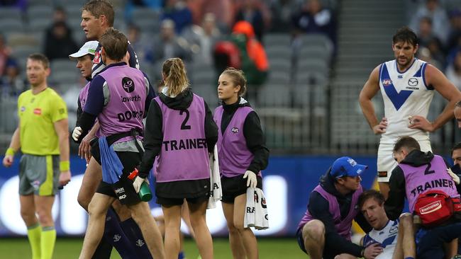 Kanga Sam Durdin (right) came off second best from a big collision with Aaron Sandilands. Pic: Getty Images