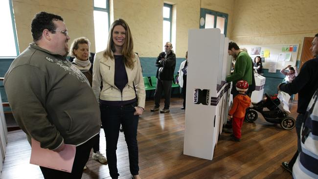 Federal Labor candidate Kate Ellis, sitting member for the seat of Adelaide, casting her vote at a polling booth in Melbourne Street, North Adelaide.