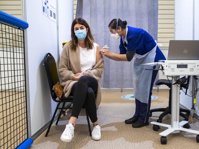 Fiona Simmonds has her second pfizer Covid-19 vaccine at the Melbourne Showgrounds vaccine hub. Picture: Aaron Francis