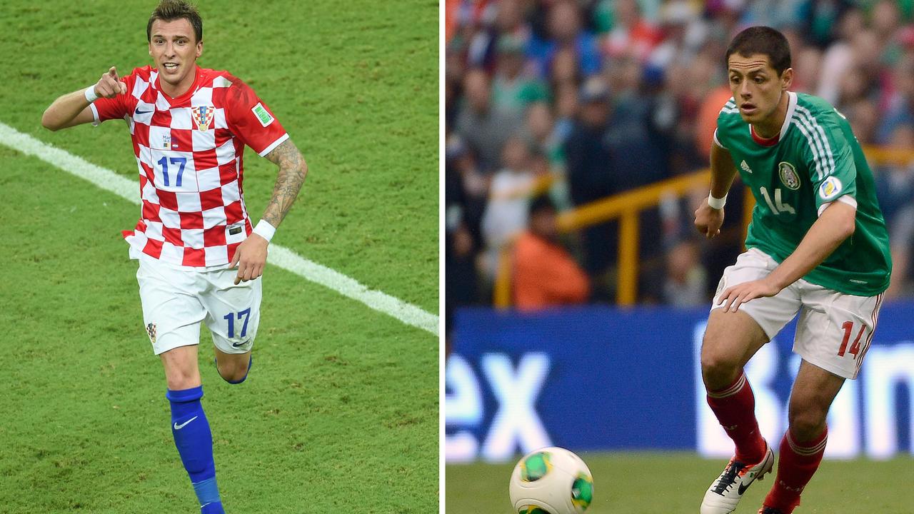 (FILES) This file photo shows (L) Croatia's forward Mario Mandzukic in the Amazonia Arena in Manaus on June 18, 2014 and (R) Mexico´s Javier Hernandez at the Azteca stadium in Mexico City on June 11, 2013. Croatia will face Mexico for their Group A football match at the Pernambuco Arena in Recife during the 2014 FIFA World Cup on June 23, 2014. AFP PHOTO / FILES / EMMANUEL DUNAND / Alfredo ESTRELLA