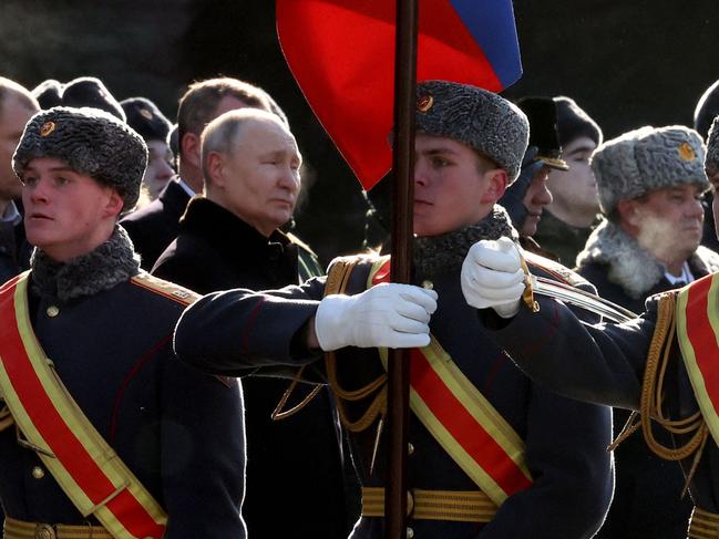 Russian President Vladimir Putin attends a wreath-laying ceremony at the Eternal Flame and the Unknown Soldier's Grave in the Alexander Garden in Moscow. Pictiure: AFP