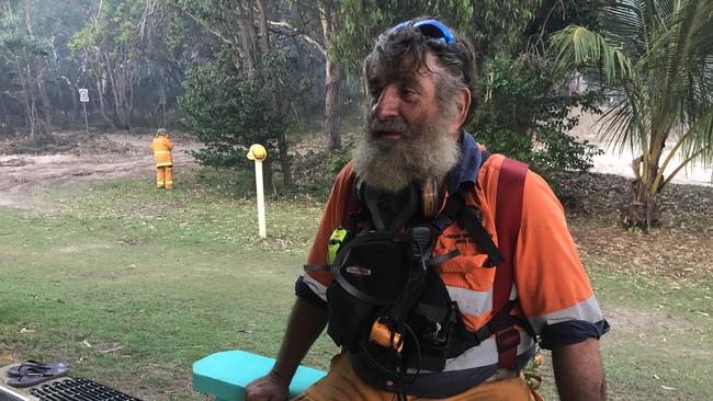 Happy Valley volunteer firefighter Winston Williams exhausted at the end of the day on Monday evening, December 7, 2020. Picture: Elspeth Murray