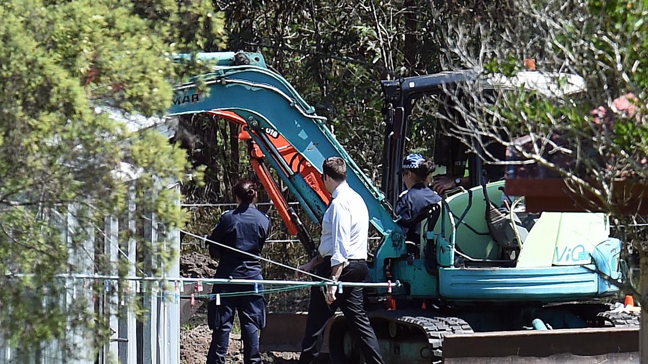 Police excavate a section behind the foster home of Queensland schoolgirl Tiahleigh Palmer at Chambers Flat, south of Brisbane, in 2016.