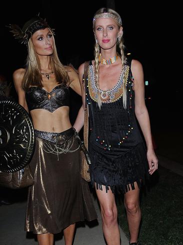 Paris and Nicky Hilton attend a Halloween party on Friday night.