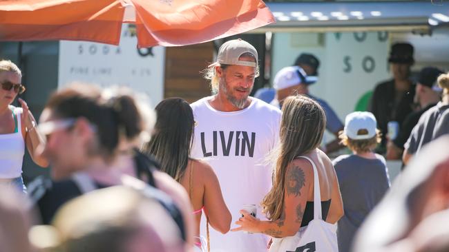 Vikings and Boys Swallows Universe star and Travla lager beer founder Travis Fimmel at the Gold Coast Open of surfing at Burleigh Heads on Saturday. Picture: Glenn Campbell