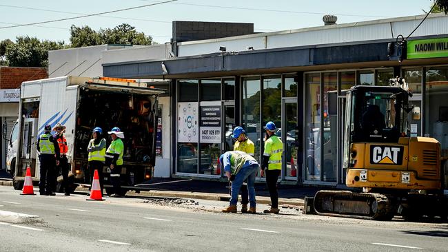 SA Water crews work on the burst water main on South Rd at St Marys, near Norrie Ave. Picture: Mike Burton
